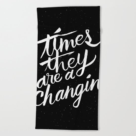 times they are a changin' Beach Towel