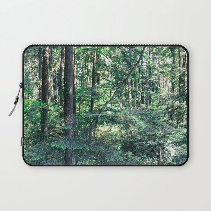 Lush green leaves among forrest canopy Laptop Sleeve