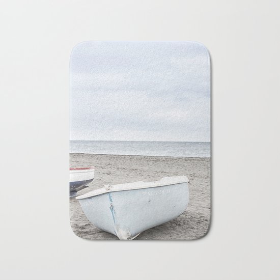 Lonely boats at the beach Bath Mat