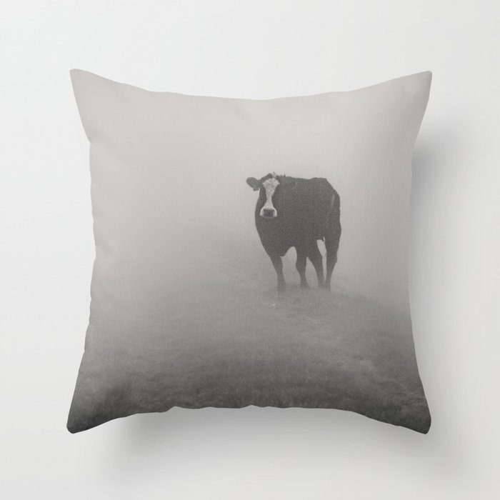 Wandering bovine above the mist Throw Pillow
