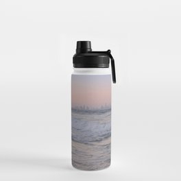 On the beach after sunset Water Bottle