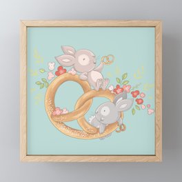 Two bunnies on a pretzel Framed Mini Art Print