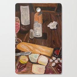 wine and cheese in a cave Cutting Board