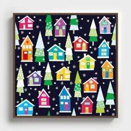 Winter background with cartoon colored houses Framed Canvas