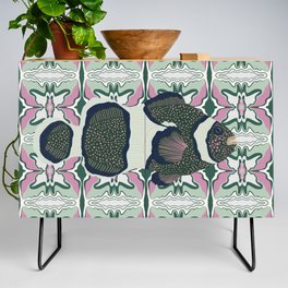 Clownfish swimming on a green and pink patterned background Credenza