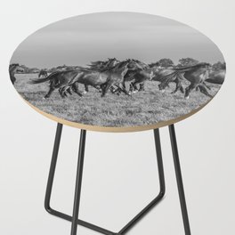 Wild horses running in the sun | Horse photography Netherlands | Nature travel black an white animal photo print Side Table