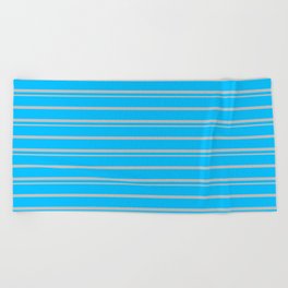 [ Thumbnail: Deep Sky Blue and Grey Colored Pattern of Stripes Beach Towel ]