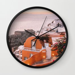 Sunset View over Santorini | Village of Oia in the Greek Cyclades | Orange and Yellow Tones: Travel Photography in Greece Wall Clock
