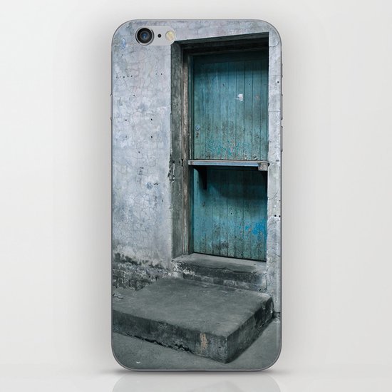 What's behind the old blue door? iPhone Skin