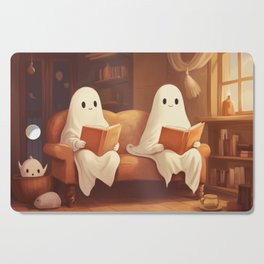 two cute ghosts reading books in a cozy library armchair setting Cutting Board