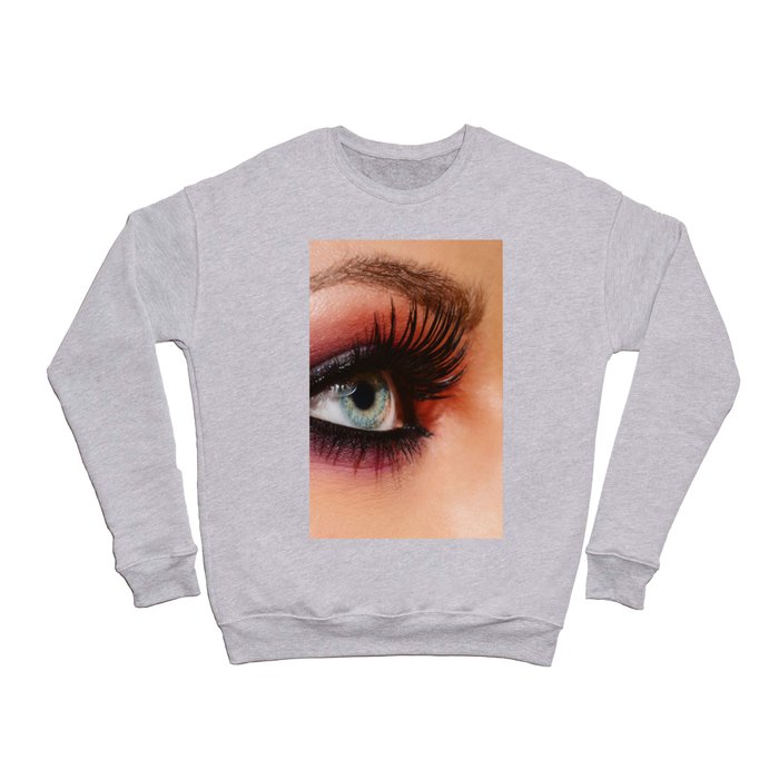 Cosmetics & make-up. Close up woman eye with beautiful shades smokey eyes makeup. Modern fashion Crewneck Sweatshirt