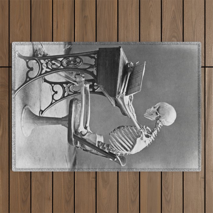Skeleton Reading at a Desk - School's Out for Summer black and white photography - black and white photographs Outdoor Rug