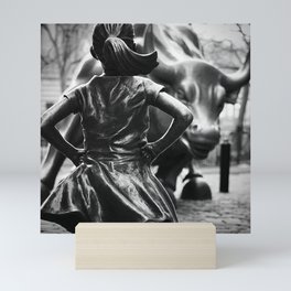 Fearless Girl facing down the Charging Bull statue of Wall Street black and white photography Mini Art Print