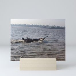 Fisherman in boat Mini Art Print