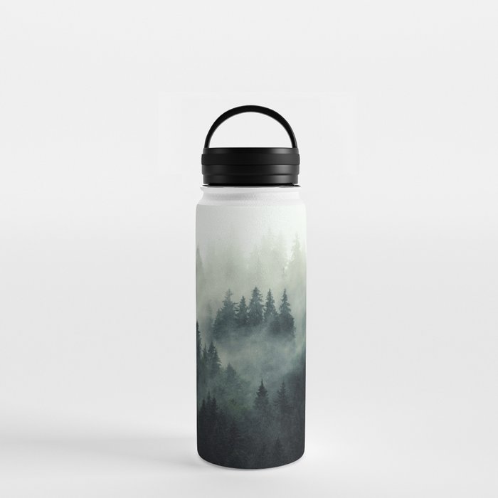 Misty mountain pine forest in cloudy and rainy - vintage style photo Water Bottle