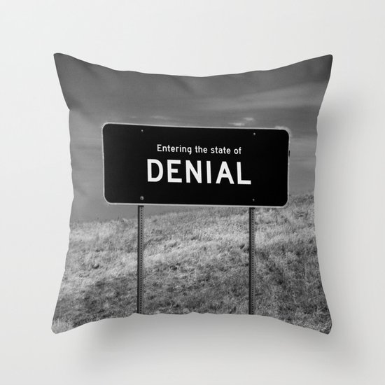 State of denial Throw Pillow
