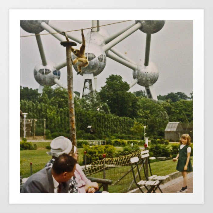 A monkey, the Atomium and a lollypop Art Print