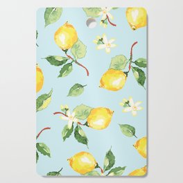 Lemons on Sky blue background Cutting Board