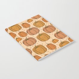 Autumn seamless pattern with different pumpkins and seeds on beige background Notebook