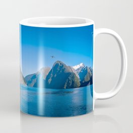 A small boat in the morning at Milford Sound Coffee Mug