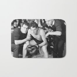 Boxer in corner with trainers Bath Mat