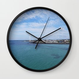 The blue sea and windmills of Gimnyeong, east of Jeju Island of South Korea, captured by drone Wall Clock