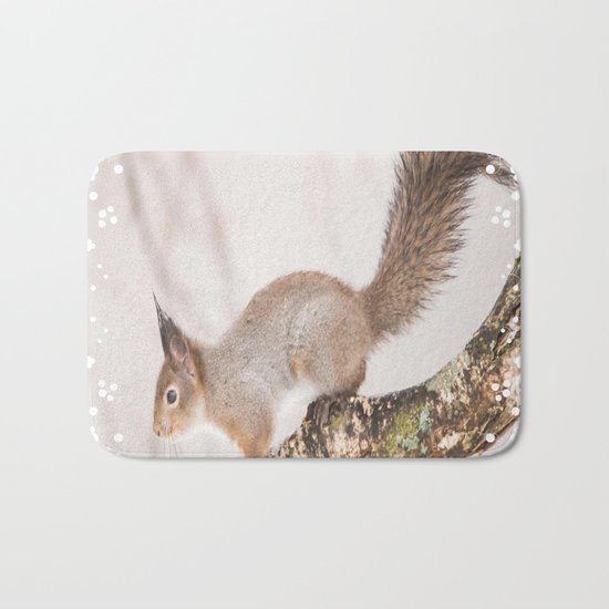 Little squirrel jumping on the branch Bath Mat