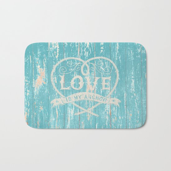 Maritime Design- Love is my anchor on aqua grunge wood background Bath Mat