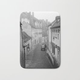 Foggy Beaune, Burgundy region, France | Narrow cobblestone street Bath Mat