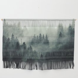 Misty pine forest on the mountain slope in a nature reserve Wall Hanging