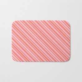 [ Thumbnail: Salmon and Pink Colored Lined Pattern Bath Mat ]