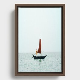 A Man Rowing A Small Boat With a Sail in Bangladesh Framed Canvas