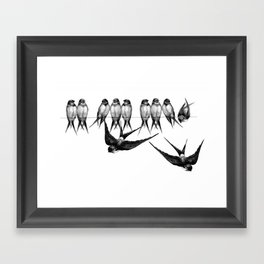 Vintage birds perched on a wire Framed Art Print