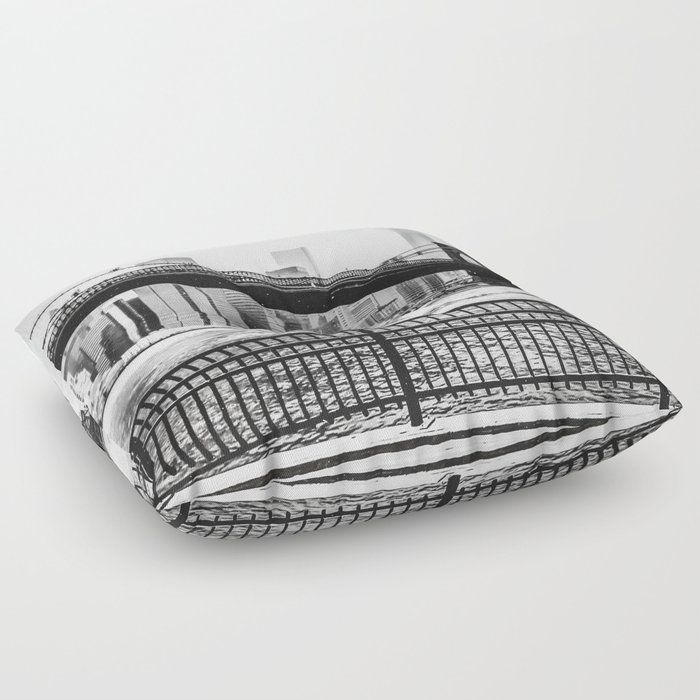 Brooklyn Bridge and Manhattan skyline during winter snowstorm in New York City black and white Floor Pillow
