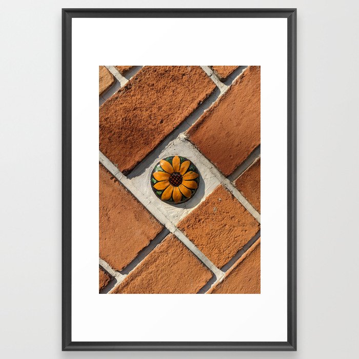 Floral ceramic on geometric brick wall Framed Art Print