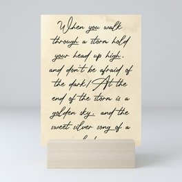 Quotes When you walk through a storm hold Mini Art Print