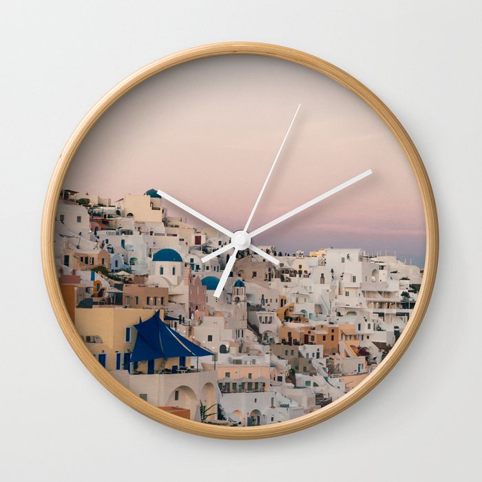 Sunset over Oia, Santorini | White houses, pink sky and golden hour | Travel photography in Greece Wall Clock