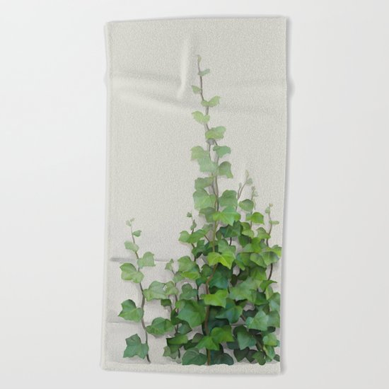 By the wall Beach Towel