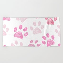 Pink colored paw print background Beach Towel
