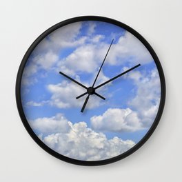 Fluffy clouds blue sky sunny day Wall Clock