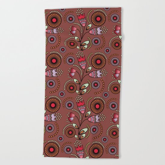 Bright stylized flowers on a brown background. Beach Towel