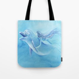 Blue Dolphin With Girl Transforming Into Mermaid Tote Bag
