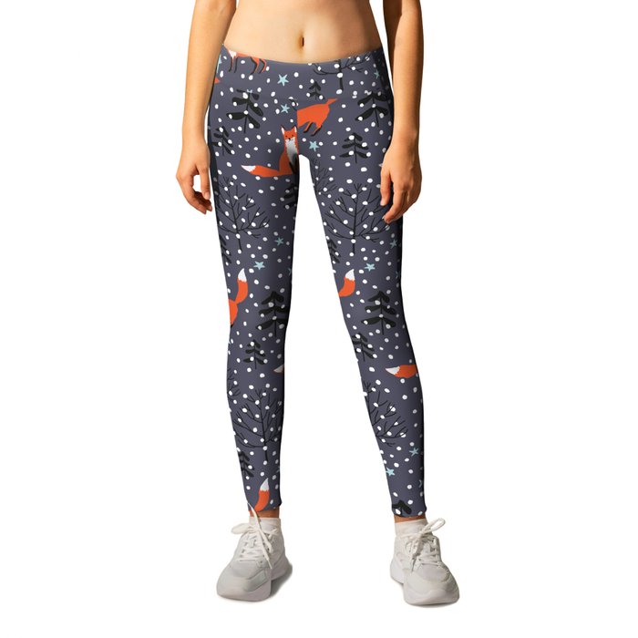 Red foxes in the nignt winter forest Leggings