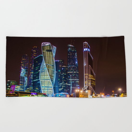 the bright lights of the city Beach Towel