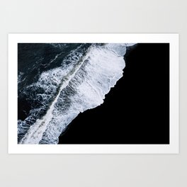 Waves crashing on a black sand beach Art Print