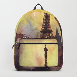 Eiffel Tower rising above buildings of Paris, France.  Backpack