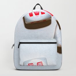 dice with letters make up the word smile Backpack