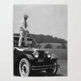 Pro golfer hitting golf ball off vintage car hood ornament on a dare par one 18th hole funny black and white golf sport photograph - photography - photographs Poster