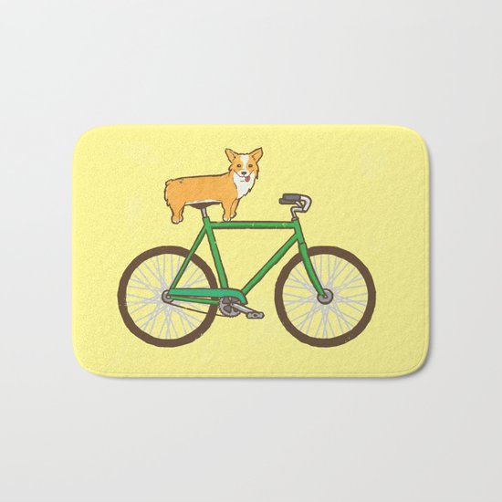 Corgi on a bike Bath Mat
