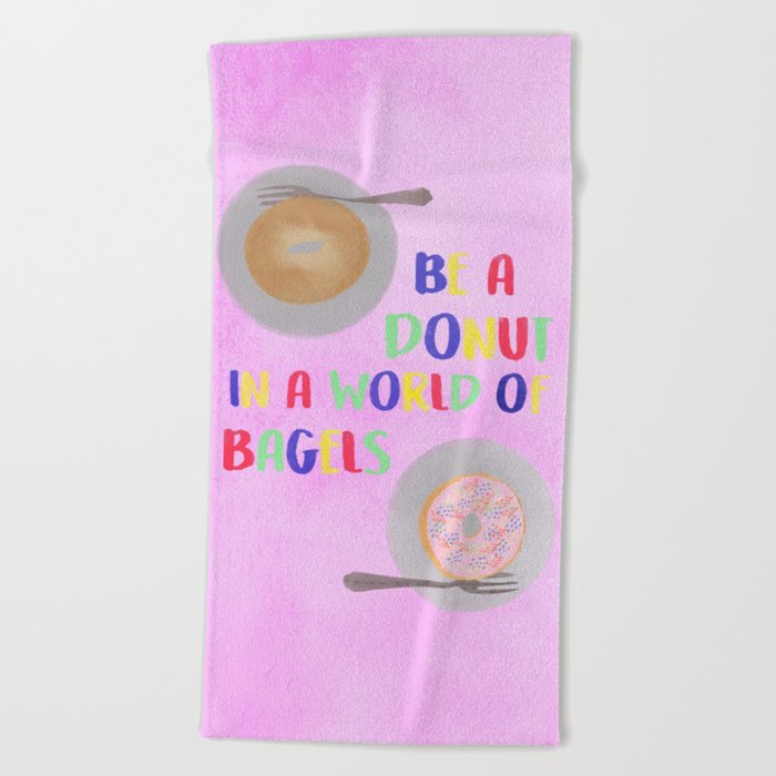 Be a Donut in a World of Bagels Beach Towel